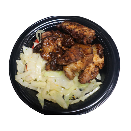 Black container with grilled pork and cabbage on a white background